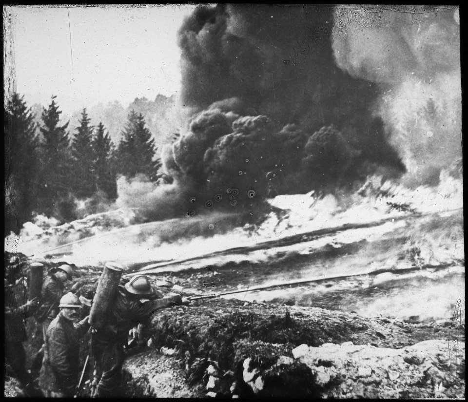 French soldiers making a gas and flame attack on German trenches in Flanders. Belgium., ca. 1900 - 1982 - NARA - 530722
