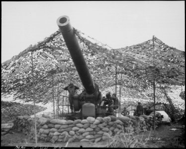 Front view of 240mm howitzer of Battery. B, 697th Field Artillery Battalion., just before firing into German held... - NARA - 531176