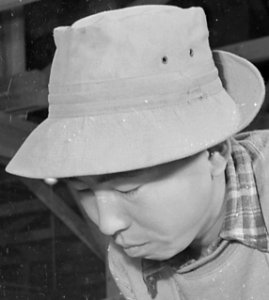 Face detail, Jerome Relocation Center, Denson, Arkansas. A young, former Californian of Japanese ancestry, now r . . . - NARA - 539332 (cropped)