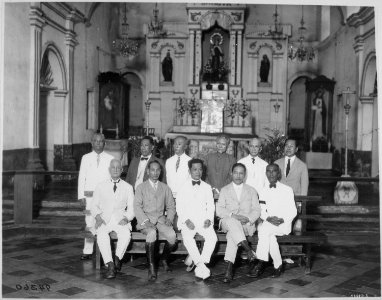General Aguinaldo (seated, center) and ten of the delegates to the first Assembly of Representatives that passed the Con - NARA - 530993 photo