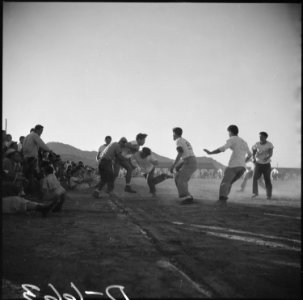 Gila River Relocation Center, Rivers, Arizona. A rousing game of football was played at this center . . . - NARA - 538623