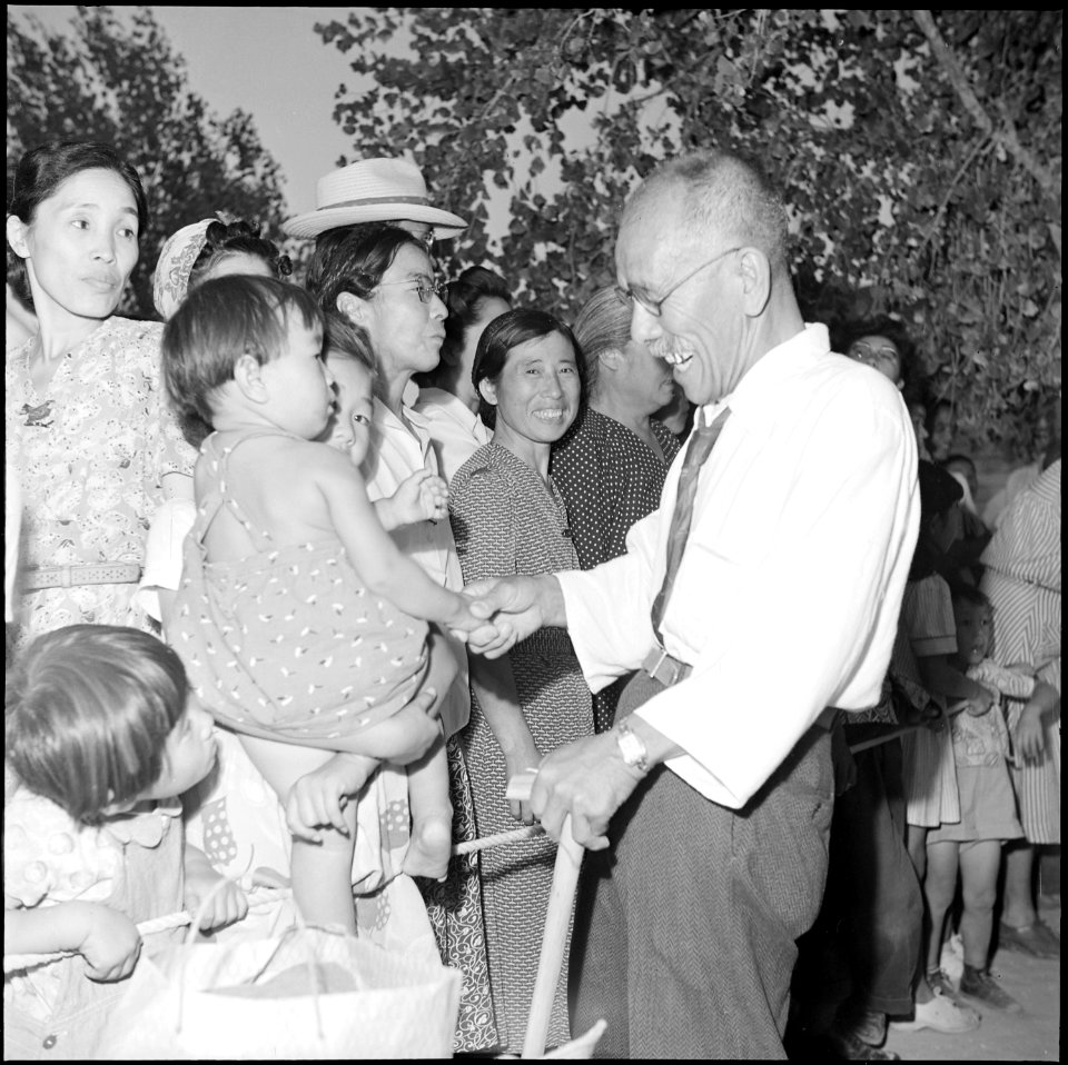 Gila River Relocation Center, Rivers, Arizona. Goodbyes are said as friends and neighbors again s . . . - NARA - 539844