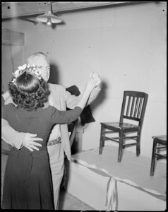 Gila River Relocation Center, Rivers, Arizona. Dave Rogers, after crowning Hido Maeyama from camp ^ . . . - NARA - 538640