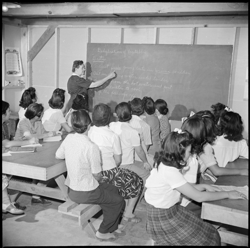 Gila River Relocation Center, Rivers, Arizona. Group picture of a class with the instructor at the . . . - NARA - 537059
