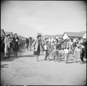 Gila River Relocation Center, Rivers, Arizona. Evacuee participants who marched in the Harvest Fest . . . - NARA - 538596