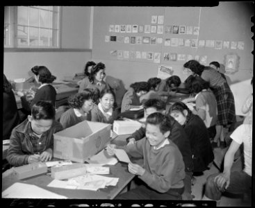Granada Relocation Center, Amache, Colorado. A Junior High School class in art, preparing their own . . . - NARA - 539039