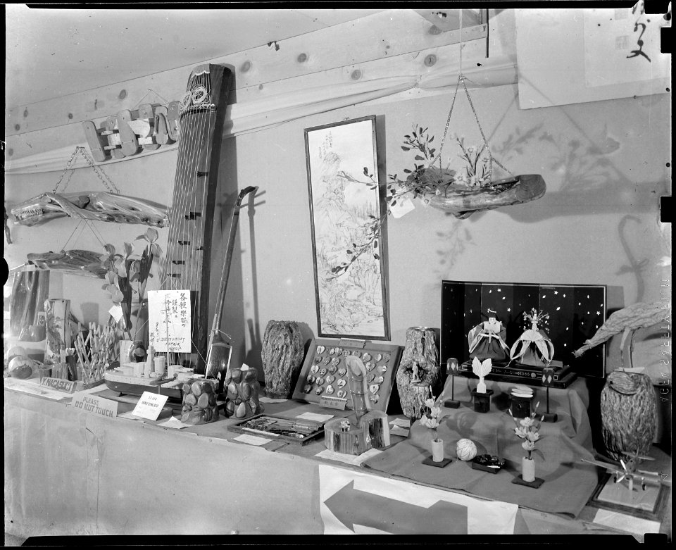 Granada Relocation Center, Amache, Colorado. A miscellaneous assortment of items on display at the . . . - NARA - 539297