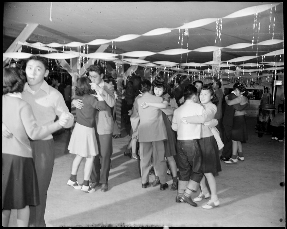 Granada Relocation Center, Amache, Colorado. A regular Saturday evening dance at Terry Hall, a mess . . . - NARA - 539062