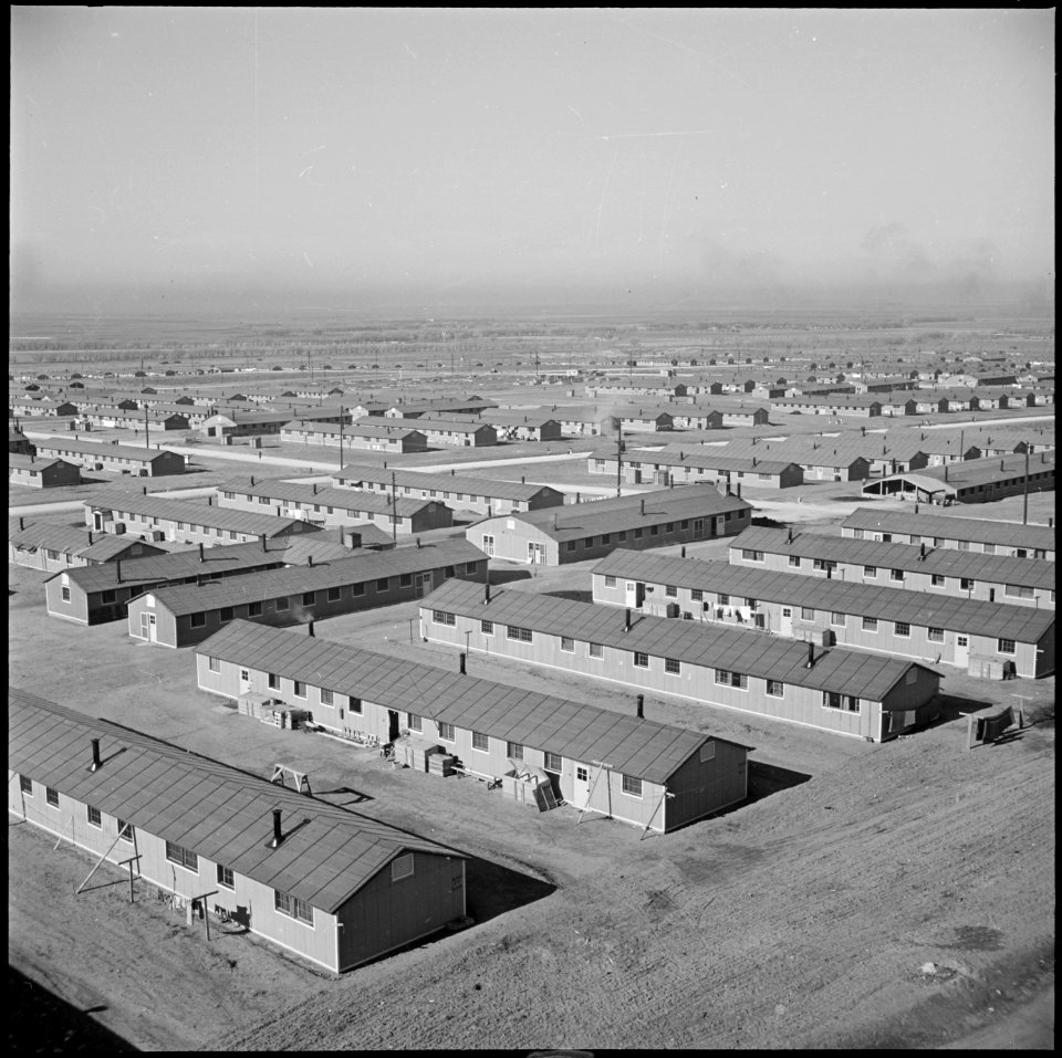 Granada Relocation Center, Amache, Colorado. A general all over view of a section of the emergency . . . - NARA - 539071