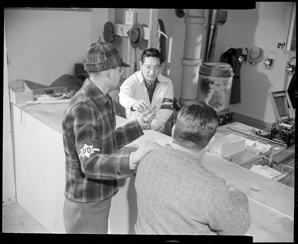 Granada Relocation Center, Amache, Colorado. A patrolman of the resident police staff brings in a c . . . - NARA - 539045