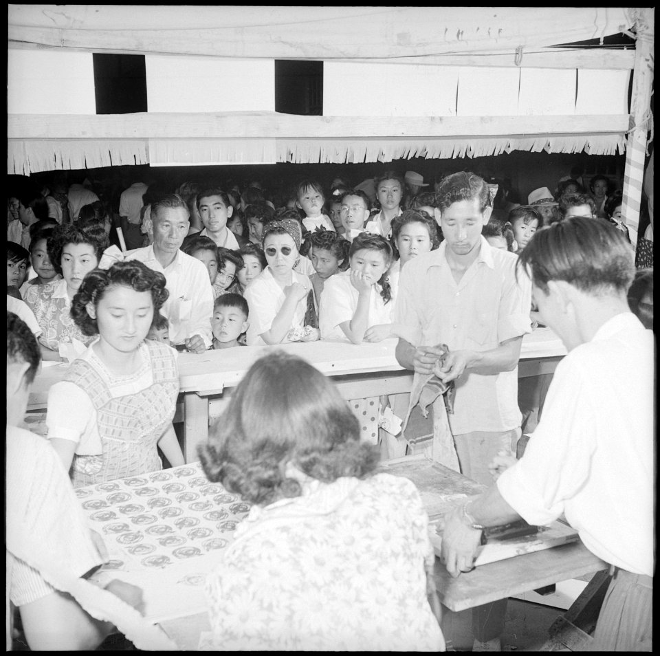 Granada Relocation Center, Amache, Colorado. A silk screen booth produced clever souvenirs, string . . . - NARA - 539406