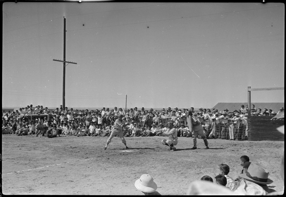 Granada Relocation Center, Amache, Colorado. A tense moment in the Amache - Prowers County all-star . . . - NARA - 537325