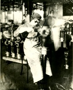 Girl doing welding photo