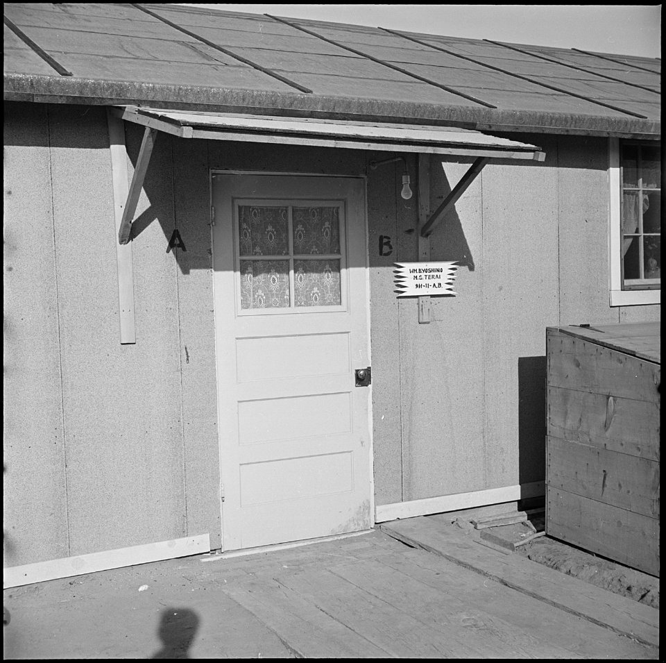 Granada Relocation Center, Amache, Colorado. A typical outside entrance to a barracks apartment. T . . . - NARA - 539132