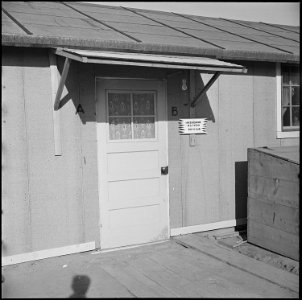 Granada Relocation Center, Amache, Colorado. A typical outside entrance to a barracks apartment. T . . . - NARA - 539132