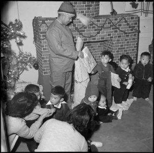 Granada Relocation Center, Amache, Colorado. Christmas at the Granada Relocation Center didn't prov . . . - NARA - 539495