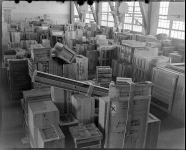 Granada Relocation Center, Amache, Colorado. Evacuee freight stored in high school gymnasium prior . . . - NARA - 539952