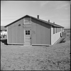 Granada Relocation Center, Amache, Colorado. Each block in the center has a recreation hall, origin . . . - NARA - 539130