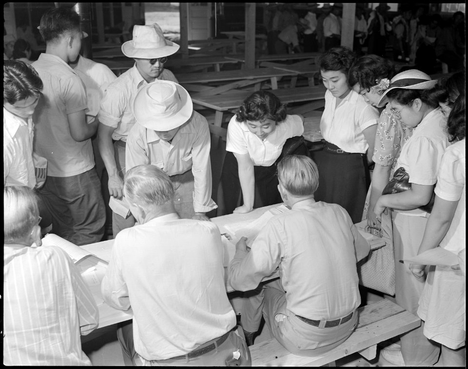 Granada Relocation Center, Amache, Colorado. First contingent workers volunteers for tasks necessar . . . - NARA - 538738