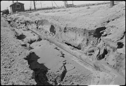 Granada Relocation Center, Amache, Colorado. Flood damage to G Street. - NARA - 537230