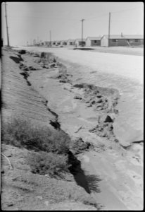 Granada Relocation Center, Amache, Colorado. Flood damage to G Street. - NARA - 537232