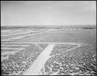 Granada Relocation Center, Amache, Colorado. Looking north over a section of the center as grading . . . - NARA - 538741