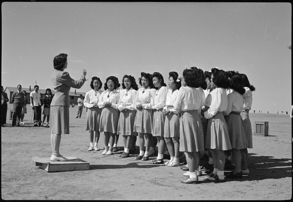 Granada Relocation Center, Amache, Colorado. High school girl's glee club. - NARA - 537173