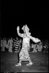 Granada Relocation Center, Amache, Colorado. Hirotaka Okubo (foreground) at the Bon Odori dance, Au . . . - NARA - 537371