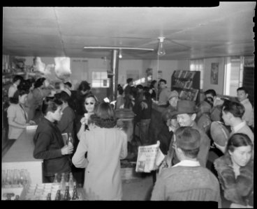 Granada Relocation Center, Amache, Colorado. Interior of the cooperative canteen on a Sunday afternoon. - NARA - 539023