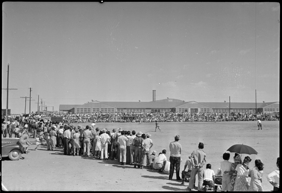 Granada Relocation Center, Amache, Colorado. Part of the crowd of 2,000 people, evacuees and outsid . . . - NARA - 537326