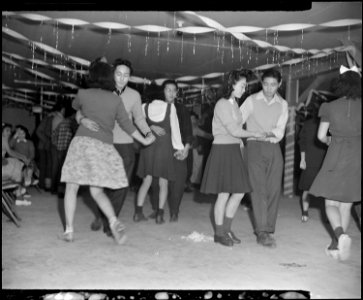 Granada Relocation Center, Amache, Colorado. Junior High School students at their first social hour . . . - NARA - 539035