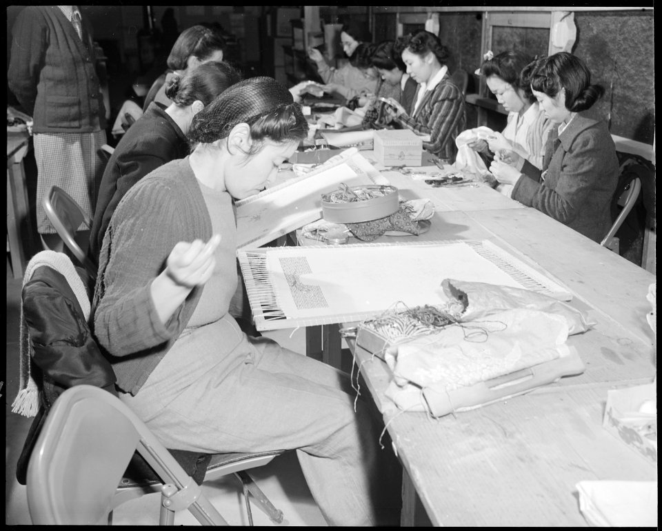 Granada Relocation Center, Amache, Colorado. In the adult class in fine needle work, this center re . . . - NARA - 539031