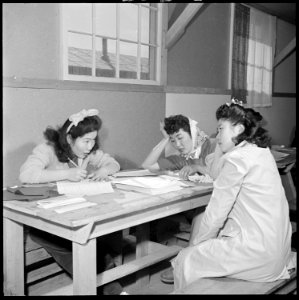 Granada Relocation Center, Amache, Colorado. Mary Oki, a member of the Center Education Department, . . . - NARA - 539288