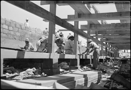 Granada Relocation Center, Amache, Colorado. Root cellar under construction. - NARA - 537239