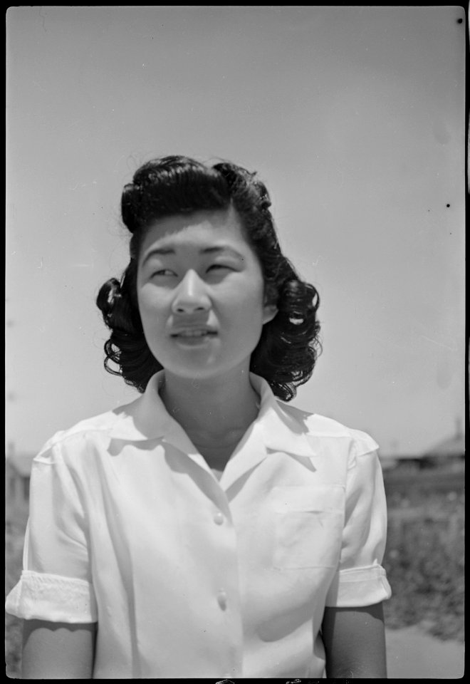 Granada Relocation Center, Amache, Colorado. Miss Marion Konishi, who made the commencement speech . . . - NARA - 537225
