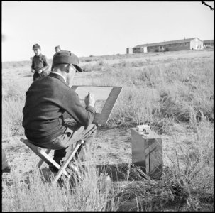 Granada Relocation Center, Amache, Colorado. On a sunny Sunday December afternoon, a center residen . . . - NARA - 539108