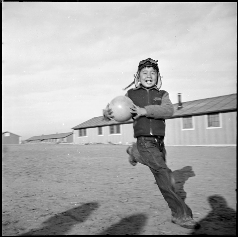Granada Relocation Center, Amache, Colorado. Play ground games during the winter calls for a lot of . . . - NARA - 539067