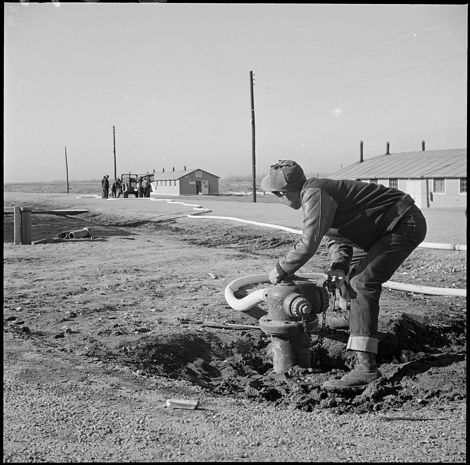Granada Relocation Center, Amache, Colorado. Strategically located fire plugs provide adequate wate . . . - NARA - 539137