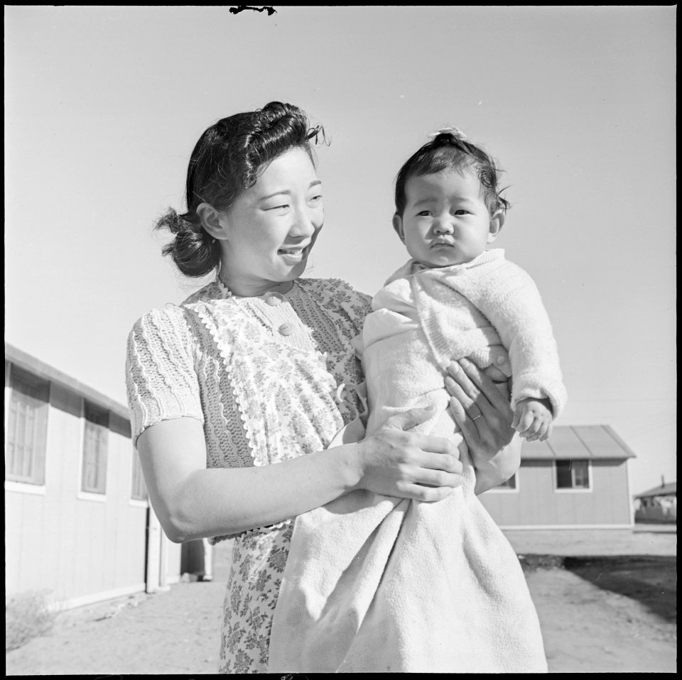 Granada Relocation Center, Amache, Colorado. The youngest of the Kobayashi family, out for an after . . . - NARA - 539088