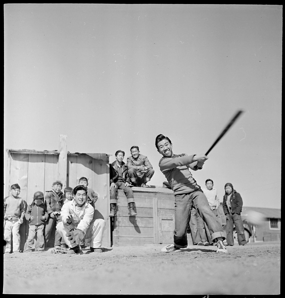 Granada Relocation Center, Amache, Colorado. Saturday afternoon finds a group of boys in the center . . . - NARA - 539303