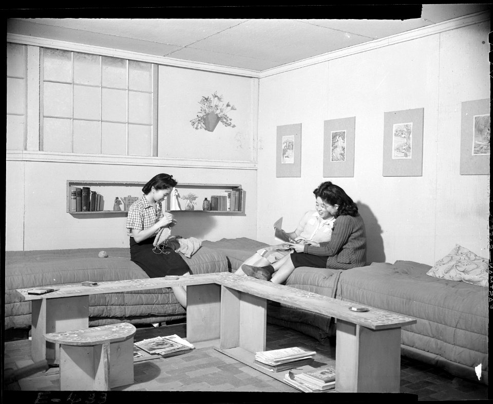 Granada Relocation Center, Amache, Colorado. Sunday afternoon and the three girls who occupy this b . . . - NARA - 539010