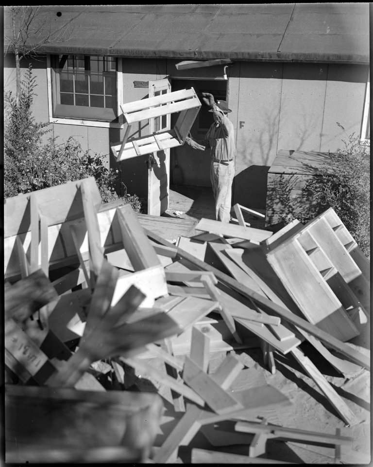 Granada Relocation Center, Amache, Colorado. Tables, benches, chairs, etc., made from scrap lumber . . . - NARA - 539947