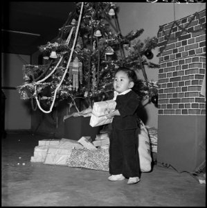 Granada Relocation Center, Amache, Colorado. The youngest member in the family of Joe Akashoshi, fo . . . - NARA - 539496