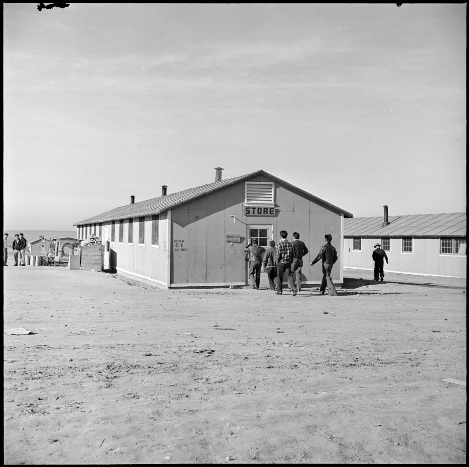 Granada Relocation Center, Amache, Colorado. The exterior of the cooperative canteen which indicate . . . - NARA - 539116