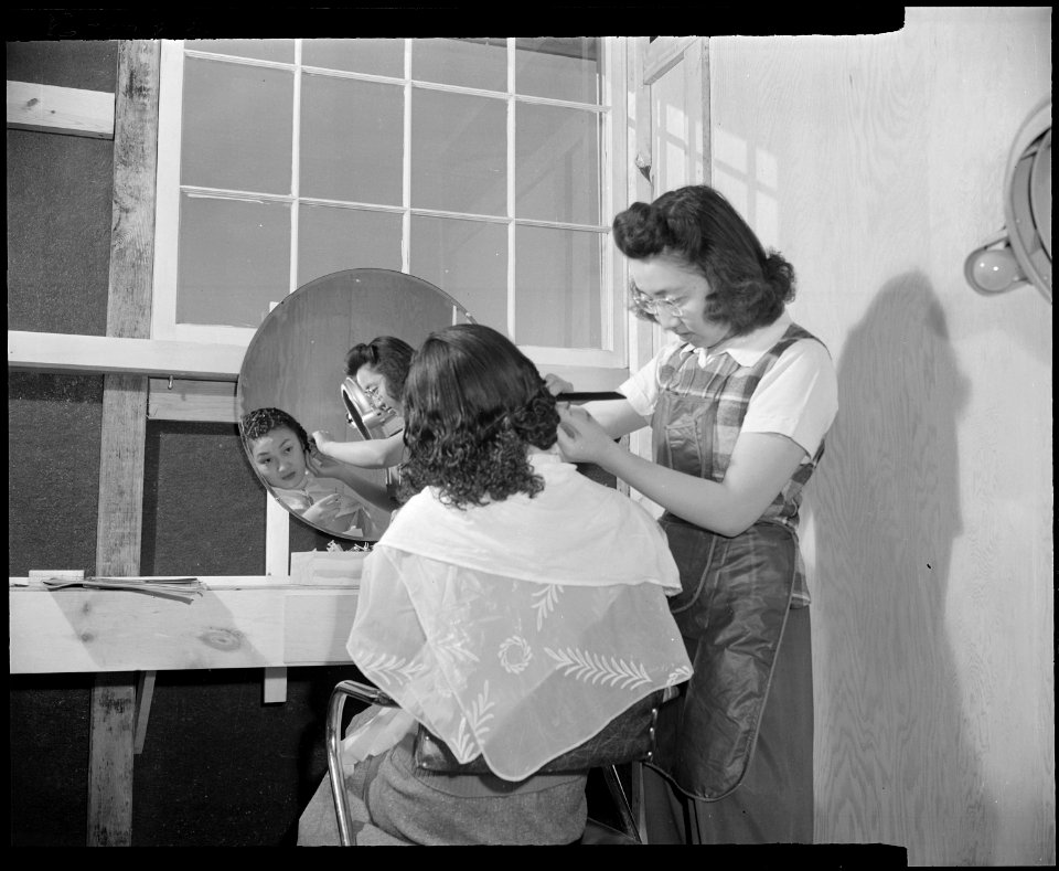 Granada Relocation Center, Amache, Colorado. With makeshift equipment and arrangements, the coopera . . . - NARA - 539018