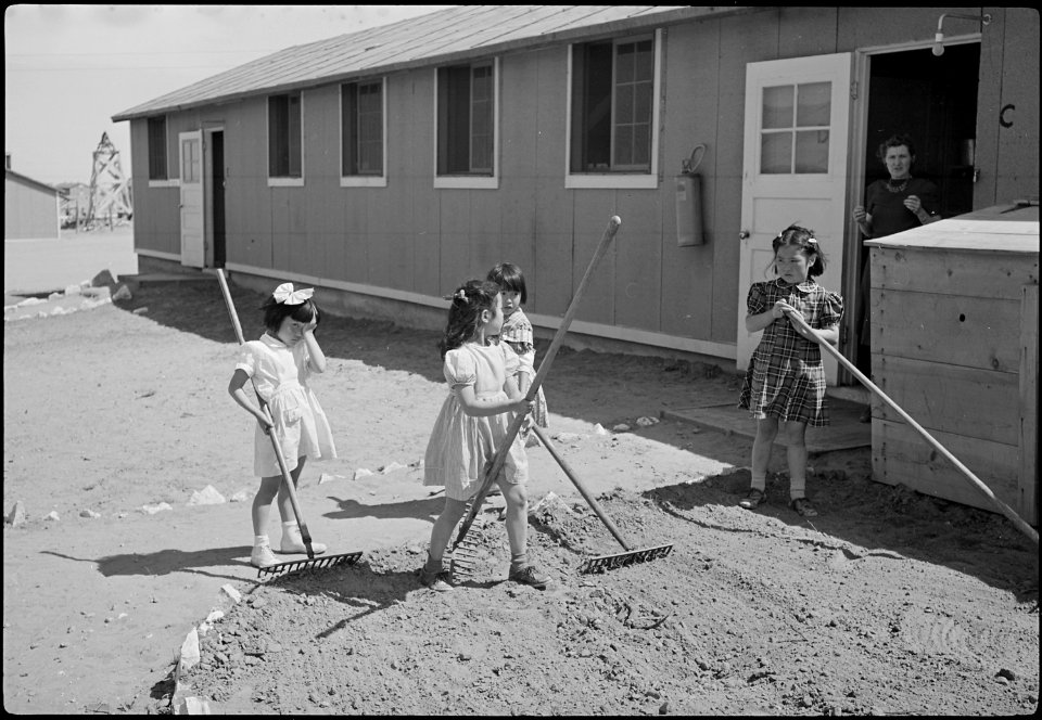 Granada Relocation Center, Amache, Colorado. View showing Elementary children landscaping the groun . . . - NARA - 539395