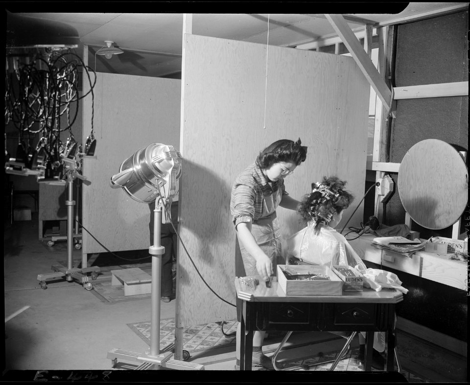 Granada Relocation Center, Amache, Colorado. With makeshift equipment and arrangements, the coopera . . . - NARA - 539021