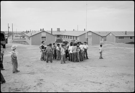 Granada Relocation Center, Amache, Colorado. View of evacuee children playing. - NARA - 537176