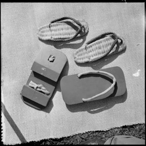 Granada Relocation Center, Amache, Colorado. Zori (straw sandals) and Geta (wooden clogs) made at G . . . - NARA - 539914