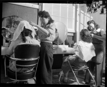 Granada Relocation Center, Amache, Colorado. With makeshift equipment and arrangements, the coopera . . . - NARA - 539022